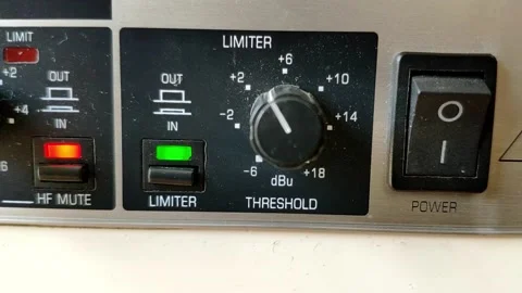 Audio device with knobs and LED lights. Unit is turned on from a switch to 動画素材 145765208