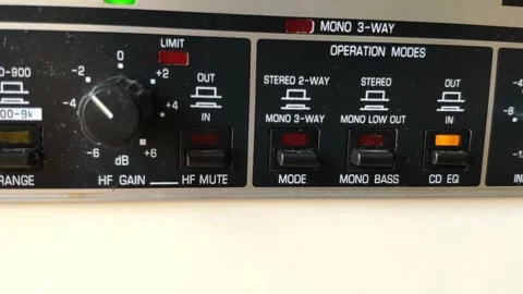 Audio device with knobs and rectangular LED feedback  lights. Camera pans 動画素材 145765410