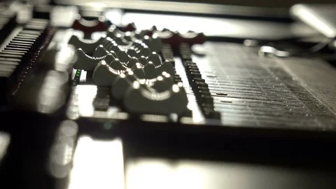 Audio Engineer Adjusting Faders On His Mixing Console Desk Video stock 70856690