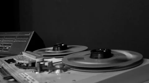 Audio Engineer Adjusting Two Track Tape Machine (Black &amp; White) Video stock 54671648