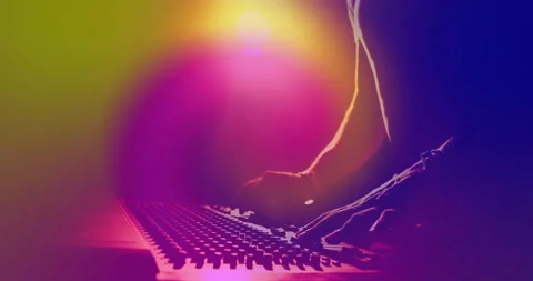 Audio engineer approaching board twisting knobs sliding faders amid lens flare 스톡 동영상 312348151