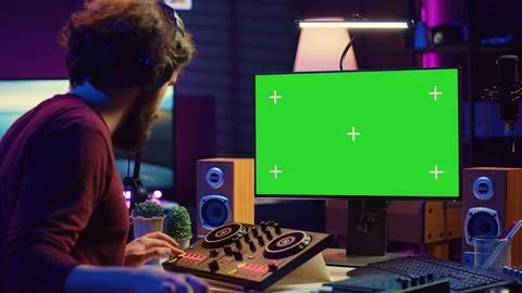Audio engineer learning to mix piano notes with mixing console Stockfoto's