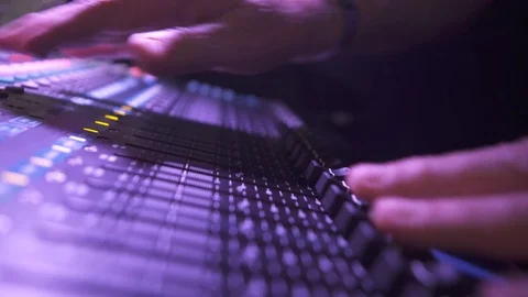 Audio engineer turning on soundboard mixer 4k Stock Footage 70147536