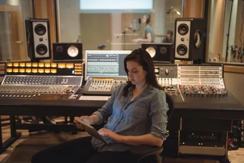 Audio engineer using digital tablet Stock Photos