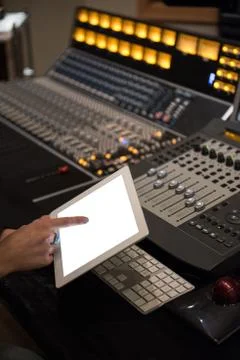 Audio engineer using digital tablet Stock Photos
