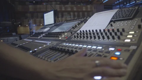Audio Engineer working on sound desk Stock Footage 98764352
