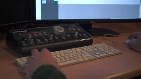 Audio Engineer working at studio Video stock 237553429