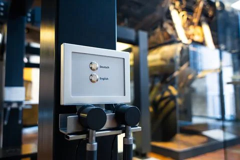 Audio guide device telling about the object in the selected language Stock Photos