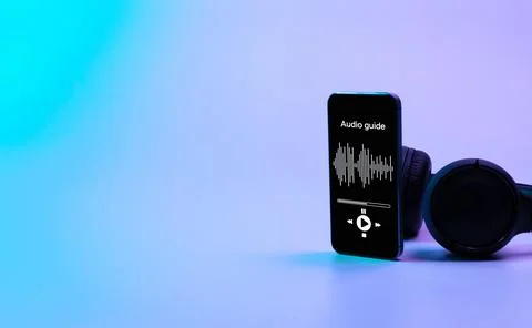 Audio guide online app on digital mobile smartphone screen with music headpho Stock Photos