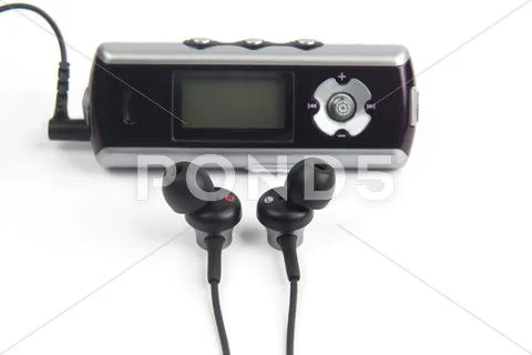 Audio headphones are small in the case of the music player Stock Photos