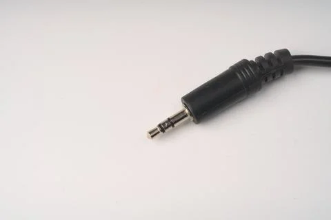 Audio jack 3.5 closeup wire on a white background. Stock Photos