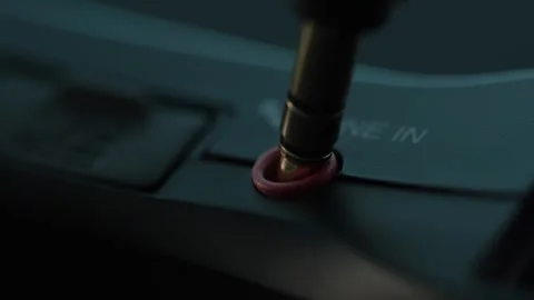 Audio Jack Plugged into Sound Device Line In. Stock Footage 265855831