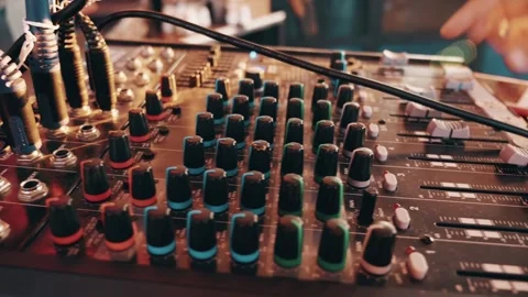 Audio mixer console knobs close up. Modern sound studio equipment Stock Footage 246330303