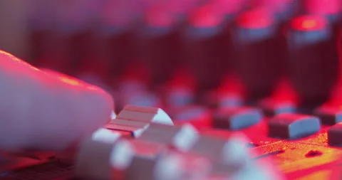 Audio Mixer Macro Close Up. Audio Engineer Pushes Master Faders. Stock Footage 167611323