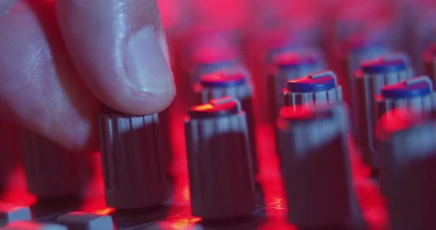Audio Mixer Macro Close Up. Audio Engineer adjusts Pan From Left To Right. Video stock 167611369
