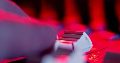 Audio Mixer Macro Close Up. Audio Engineer Pushes Master Faders. Stock Footage 167611421
