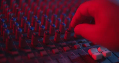 Audio Mixer Macro Close Up. Audio Engineer working on Mixing Console. Video stock 167612558