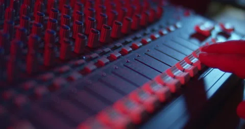 Audio Mixer Macro Close Up. Audio Engineer Pushes Up Channel Faders. Stock Footage 167612851