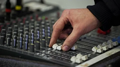 Audio mixer. Sound engineer adjusts the sound. Music Festival. Change the volume Stock Footage 235234006