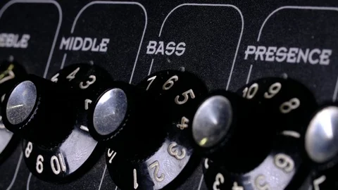 Audio mixer in a studio, the automatic knobs moving up and down on console Video stock 118929819