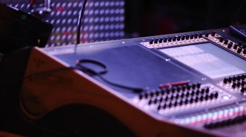 Audio Mixing Console with Audio Engineer in front during Show 動画素材 47825693