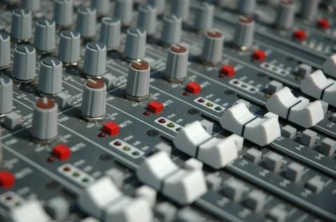 Audio mixing console in a recording studio. faders and knobs of a sound mixer. Stock Photos