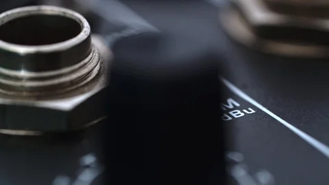 Audio nodge control setting knobs on a audio mixer, macro closeup moving 動画素材 117424422