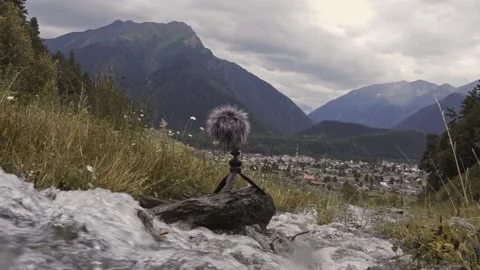 Audio recorder and mountains Stock Footage 193731561