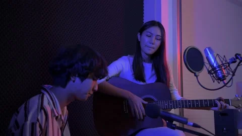 Audio recording concept of 4k Resolution. Artists are rehearsing together in  Stock Footage 144622487