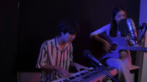 Audio recording concept of 4k Resolution. Artists are rehearsing together in  Stock Footage 153090099