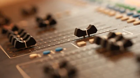 Audio recording professional adjusts large mixing board in recording studio 2 Stock Footage 39956852
