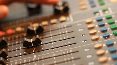 Audio recording professional adjusts large mixing board in recording studio 6 Stock Footage 39959057