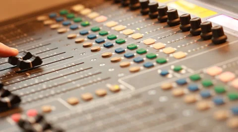 Audio recording professional adjusts large mixing board in recording studio 7 Stock Footage 39959166