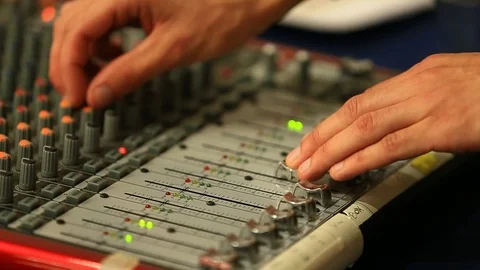 Audio Tech Mixing Sound at Live Event - Shallow Depth of Field Stock Footage 106855506