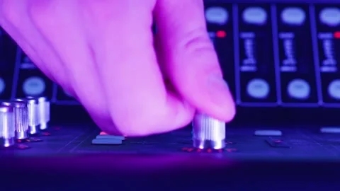 Audio Technician Adjusting Control Knob On Mixing Console Stockbeeldmateriaal 329277200