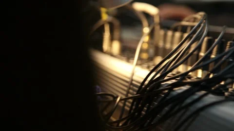 Audio technician working with audio table, slider shot Stock Footage 64738001