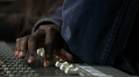 Audio technician working with audio table, slider shot 스톡 동영상 64738024