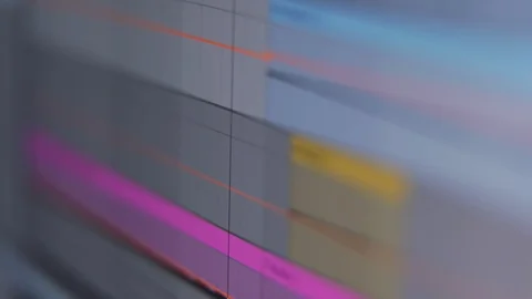 Audio track waveforms playing in music production software at home studio Stock Footage 108028258