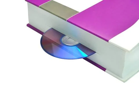 Audiobook compact disk inserted in book isolated on white representing aud... Stock Photos