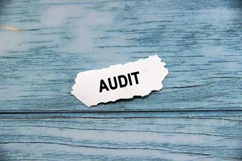 "AUDIT" text or message short word english letter on a small white paper wi.. Stock Photos