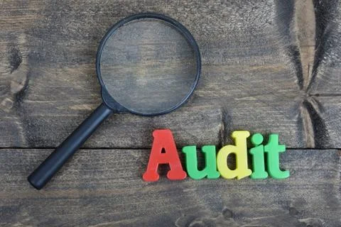 Audit on wooden table Stock Photos