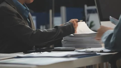Auditor and accountant working in office Analyze financial data and account.. Stock Footage 335862575