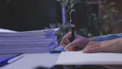 Auditor and accountant working in office Analyze financial data and account.. Stock Footage 335862736