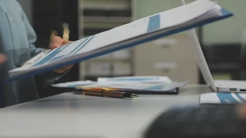 Auditor and accountant working in office Analyze financial data and account.. Stock Footage 335863003