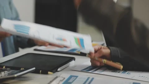 Auditor and accountant working in office Analyze financial data and account.. Stock Footage 335863039