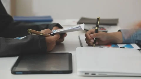 Auditor and accountant working in office Analyze financial data and account.. Stock Footage 335863049