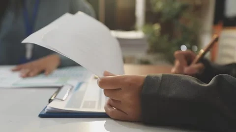 Auditor and accountant working in office Analyze financial data and account.. Stock Footage 335863210