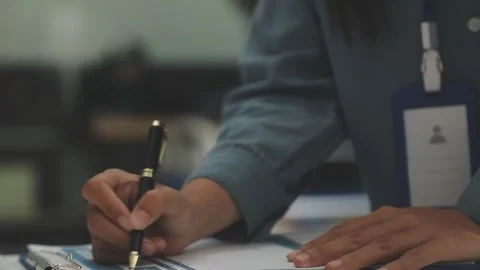 Auditor and accountant working in office Analyze financial data and account.. Stock Footage 335863414