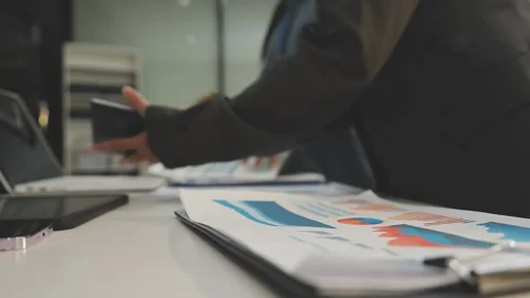 Auditor and accountant working in office Analyze financial data and account.. Stock Footage 335863475
