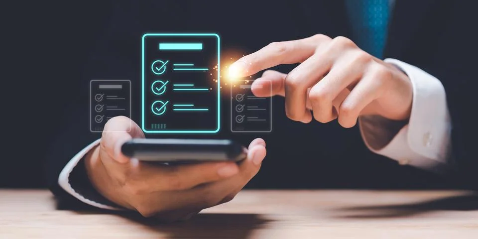 The auditor checks the documents and marks them as correct ,for certificati.. Stock Photos